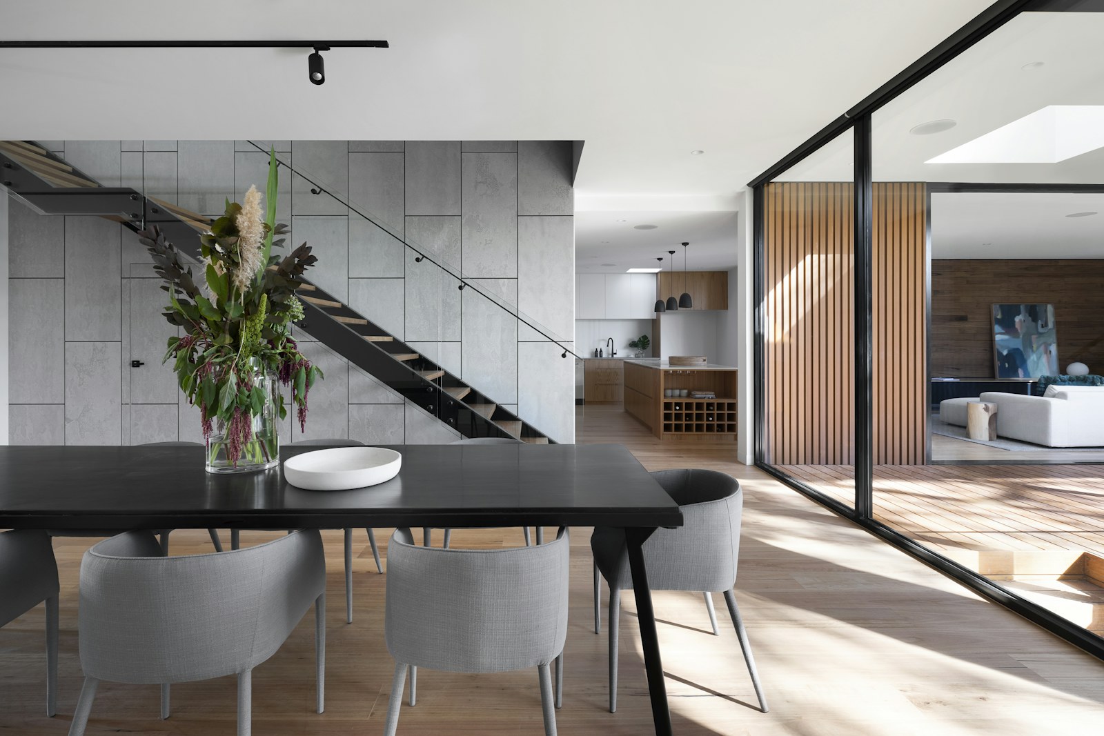 Contemporary interior framed by timber and stone